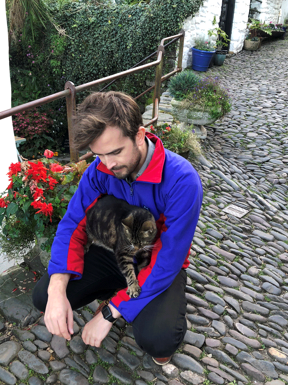 Man and cat in Clovelly