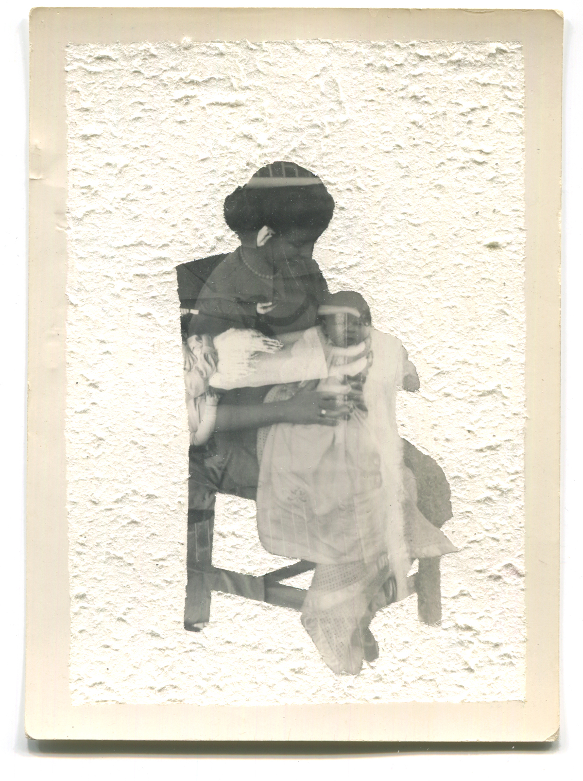Altered double-exposed photograph of a mother and baby