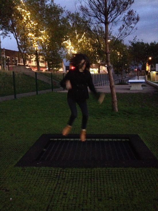 Piper Haywood jumping on trampoline in Drapers Field, London