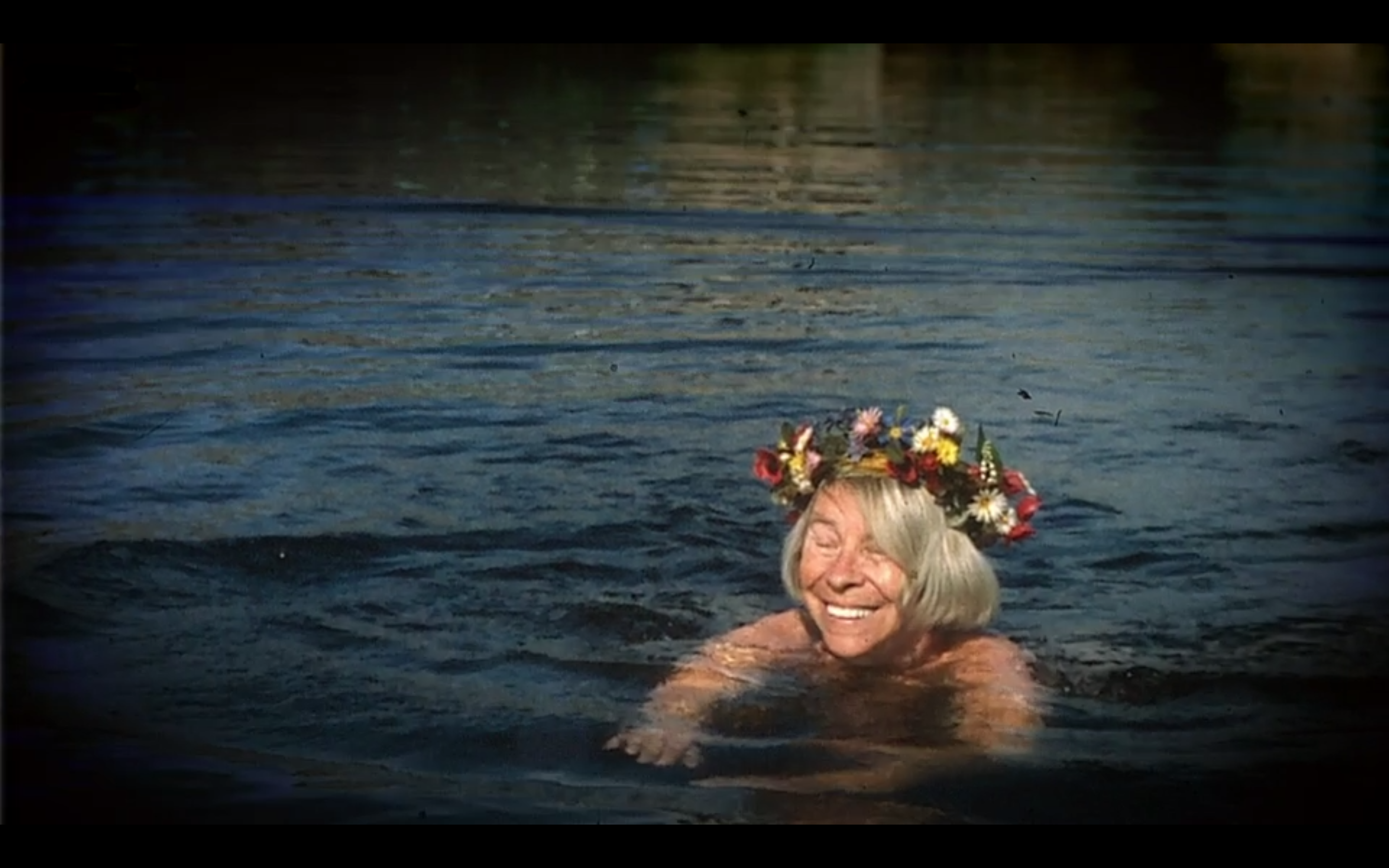 Screenshot of Tove Jansson swimming in Finland from the BBC documentary Moominland Tales: The Life of Tove Jansson