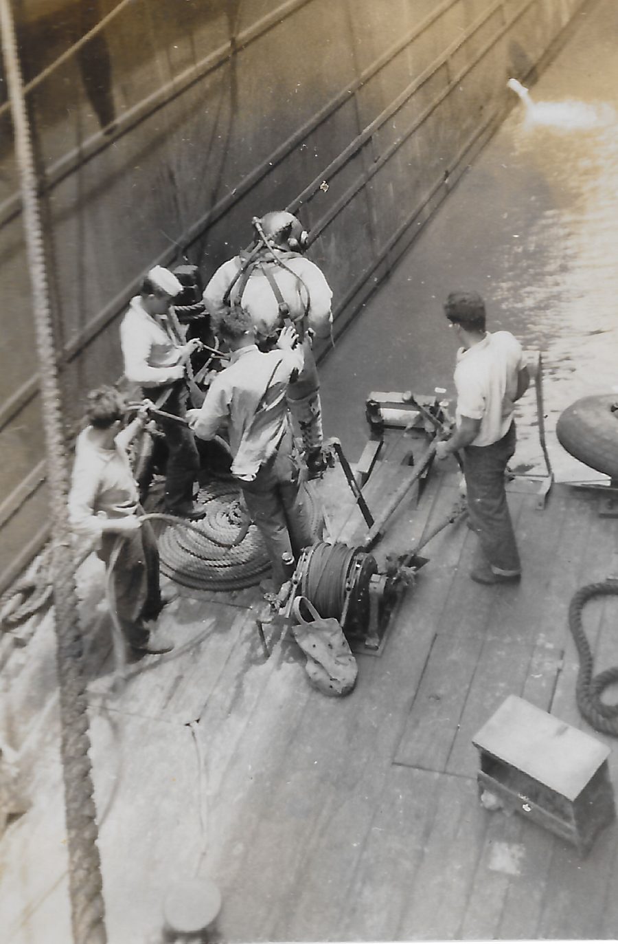 Diving for movie film in 40 ft of water during WWII. Photo taken by Bradley Piper or Renee Neuman.
