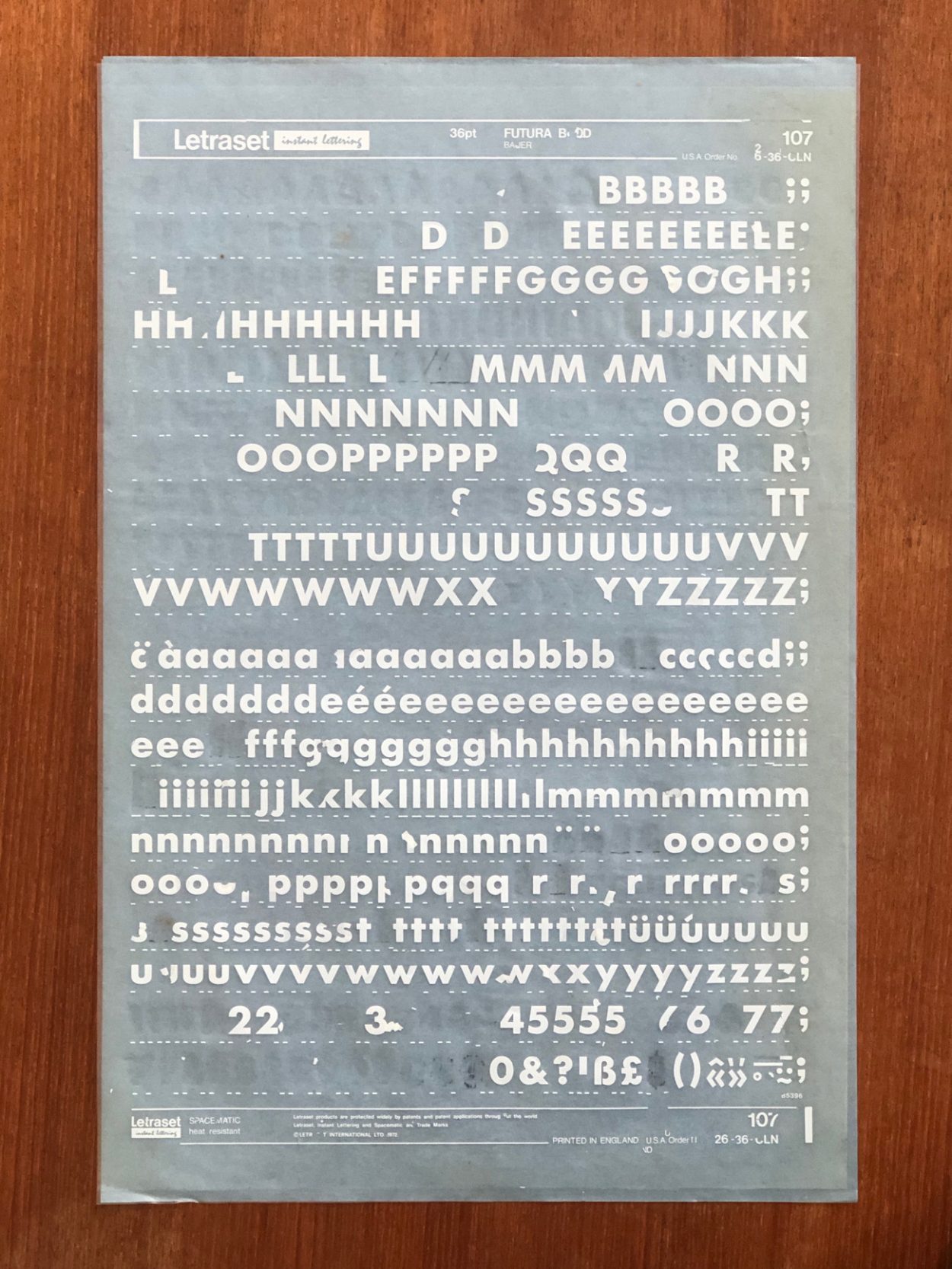 Sheet of white dry-transfer type in 36pt Futura Bold