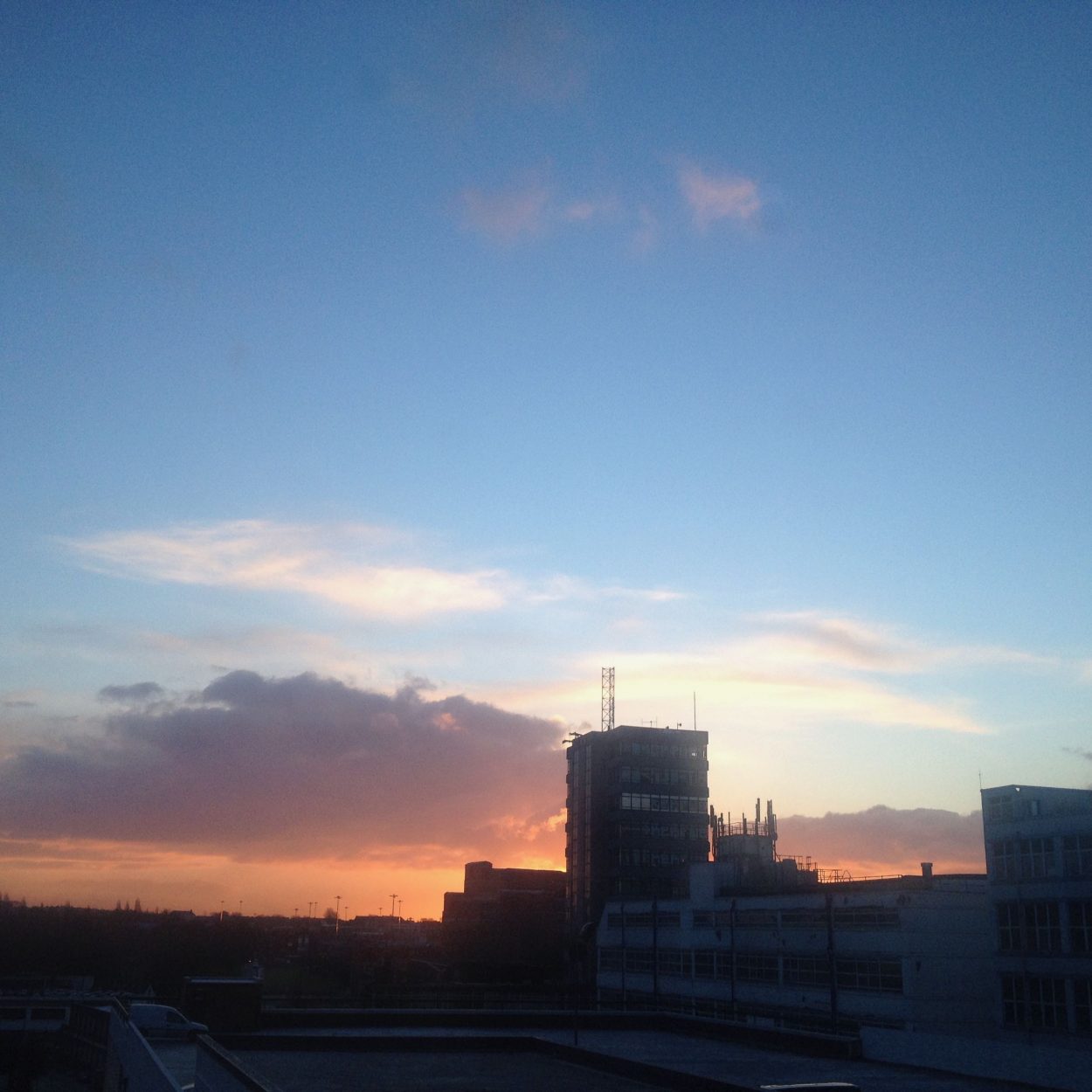 Sunrise over rooftops in Leeds
