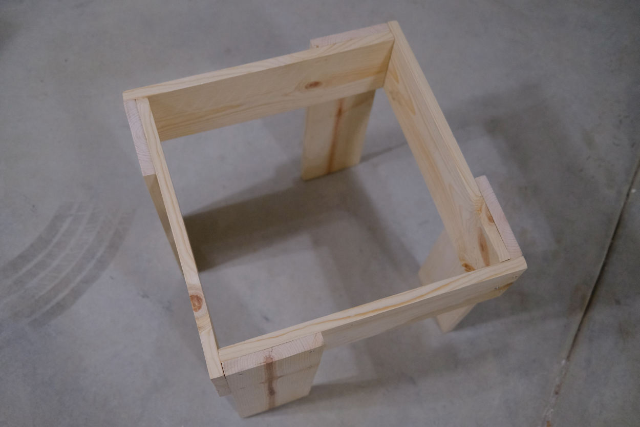 The assembled base of a Rietveld crate stool