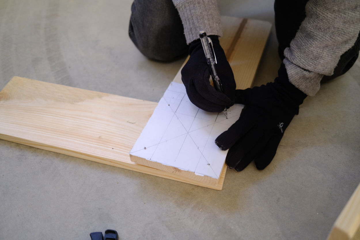 Marking pilot holes on the leg and crossbar of a Rietveld crate stool